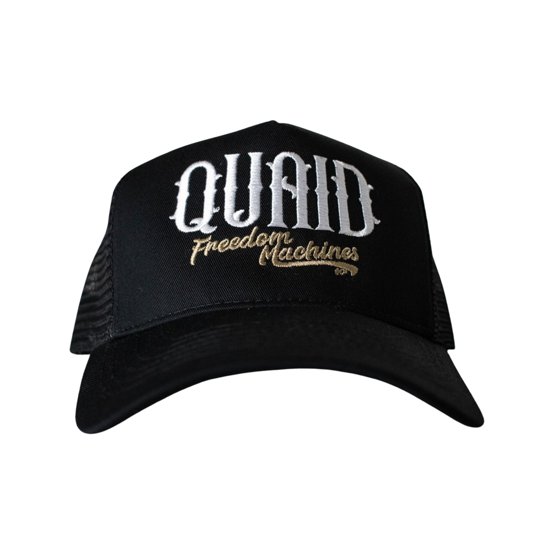 Black trucker style snapback embroidered with Quaid Freedom Machines in white and gold