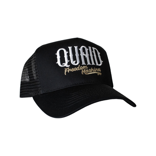 Black trucker style snapback embroidered with Quaid Freedom Machines in white and gold